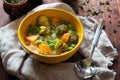 vegetable soup with carrots, green peas and broccoli Royalty Free Stock Photo