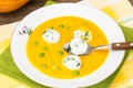 Vegetable soup cream with pumpkin, rice and green peas Royalty Free Stock Photo