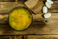 Vegetable soup in a glass bowl on wooden table. Top view Royalty Free Stock Photo