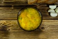 Vegetable soup in a glass bowl on wooden table. Top view Royalty Free Stock Photo