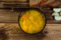 Vegetable soup in a glass bowl on wooden table. Top view Royalty Free Stock Photo