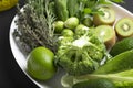 Vegetable soup, salad leaves, spinach leaves, cherry tomatoes, cherry tomatoes, glass table, fresh parsley Royalty Free Stock Photo