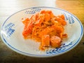 Vegetable spaghetti and fried tofu in Japanese style on a white plate on the table Royalty Free Stock Photo