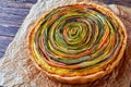 Vegetable Spiral quiche on a paper