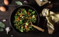 Vegetable stew in a frying pan on a dark wooden table Royalty Free Stock Photo