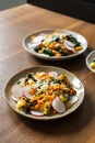 Vegetable stew in a plate at the modern kitchen