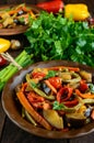 Vegetable stew salad: bell pepper, eggplant, asparagus beans, garlic, carrot, leek. Bright spicy aromatic dishes Royalty Free Stock Photo