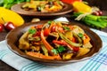 Vegetable stew salad: bell pepper, eggplant, asparagus beans, garlic, carrot, leek. Bright spicy aromatic dishes