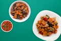 Vegetable stew on a white plate. stewed vegetables on a colored background. vegetarian food