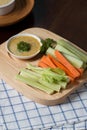 Vegetable sticks. Fresh celery and carrot, cucumber with sauce. Royalty Free Stock Photo