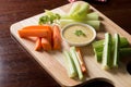 Vegetable sticks. Fresh celery and carrot, cucumber with sauce. Royalty Free Stock Photo