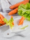 Vegetable sticks. Fresh celery and carrot with yogurt sauce. Healthy and diet food concept Royalty Free Stock Photo