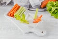 Vegetable sticks. Fresh celery and carrot with yogurt sauce. Healthy and diet food concept Royalty Free Stock Photo