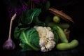 Vegetable still life on a black background