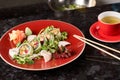 Vegetable sushi rolls with fish Royalty Free Stock Photo