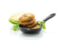 Vegetable vegetarian fried cabbage pancakes in the pan Royalty Free Stock Photo