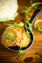 Vegetable vegetarian fried cabbage pancakes in the pan Royalty Free Stock Photo