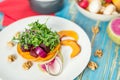 Vegetable vegetarian salad in a white plate