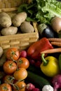 Vegetables around basket Royalty Free Stock Photo