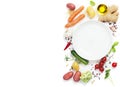 Vegetables around empty white plate Royalty Free Stock Photo