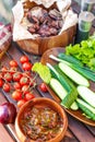 Vegetables and barbecue meat on spring weekend picnic.