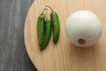 Variety of fresh vegetables in basket and chopping board ready to cook a Mexican sauce: onion, tomato, green chilies Royalty Free Stock Photo