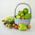 Large Peppers cucumbers and tomatoes green in basket Royalty Free Stock Photo