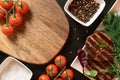 Vegetables and beef steaks on rustic metal background Royalty Free Stock Photo