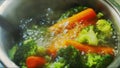 Vegetables boiling in hot water