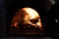 Vegetables cooking in a woodfired oven