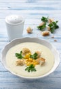 Vegetables cream soup with corn, croutons and parsley