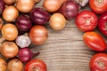 Vegetables crop background onions garlic tomatoes top view Royalty Free Stock Photo