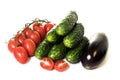 Vegetables cucumbers and tomatoes on a white Royalty Free Stock Photo