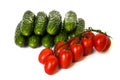 Vegetables cucumbers and tomatoes on a white Royalty Free Stock Photo