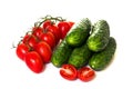 Vegetables cucumbers and tomatoes on a white Royalty Free Stock Photo