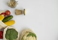 Vegetables in eco bag on white surface with a copy space. Pepper, tomato, corn, cucumber, broccoli, cauliflower in Royalty Free Stock Photo