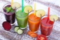 Vegetables, fresh juices mix fruit healthy drinks on wood table. Royalty Free Stock Photo