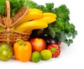 Vegetables and fruits in a basket on white background