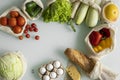 Vegetables, fruits, eggs in reusable eco cotton bags on table. Zero waste shopping concept. Plastic free items. Multi Royalty Free Stock Photo