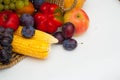 Vegetables and Fruits in Rustic Basket Isolated on White. Healthy Food. Vitamine Diet Fitness.