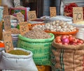 Vegetables, grains and spices in bags at the market