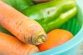 Vegetables in green bowl. Carrot, Chayot, Tomato, Ingredients, Salad.