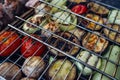 Grilled vegetable and meat skewers in a herb marinade on a grill Royalty Free Stock Photo