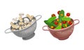 Vegetables in kitchen colander set. Strainers full of fresh tomato, lettuce and champignon mushrooms. Healthy organic