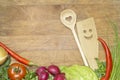 Vegetables and kitchenware on cutting board Royalty Free Stock Photo