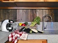 Vegetables on the marble worktop in the kitchen