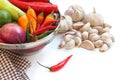 Vegetables in metal colander and garlic Royalty Free Stock Photo