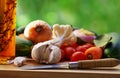 Vegetables and oliveoil on table