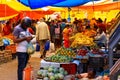 Vegetables and other fruit vendors busy at work in the bustling colorful KR Market in Bangalore, India