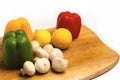 Vegetables Peeper Mushrooms Lemon in a wooden board